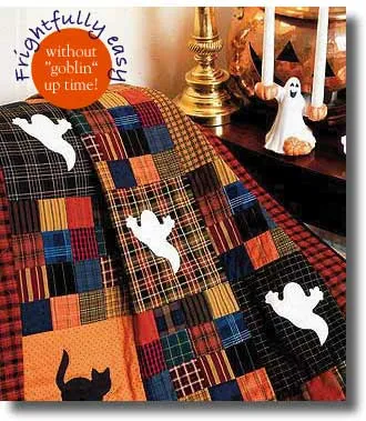 "Ghoulies & Ghosties" is a Free Halloween Lap Quilt Pattern designed by Catherine Redford from Quilting Daily!