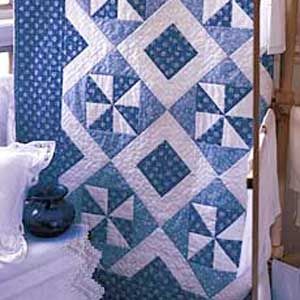 "Blue Breeze" is a Free Lap Quilt Pattern designed by Quilting Daily Team from Quilting Daily!