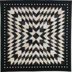 Stellar: Two-Color Medallion Lap Quilt Pattern | Quilting Daily