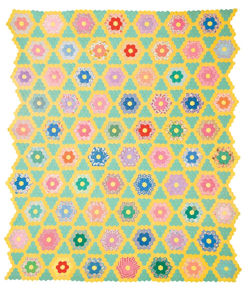 Made by Alice Dryer DeWeerd. From the collection of Bob and Joy Engelsman. “HexaGarden” appeared in Quiltmaker September/October 2011.