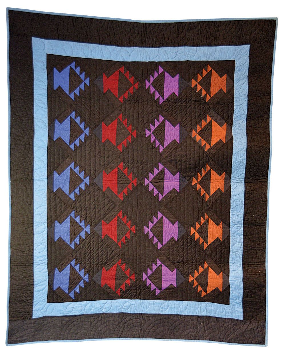 I would love to see Amish women sit around a quilting frame
