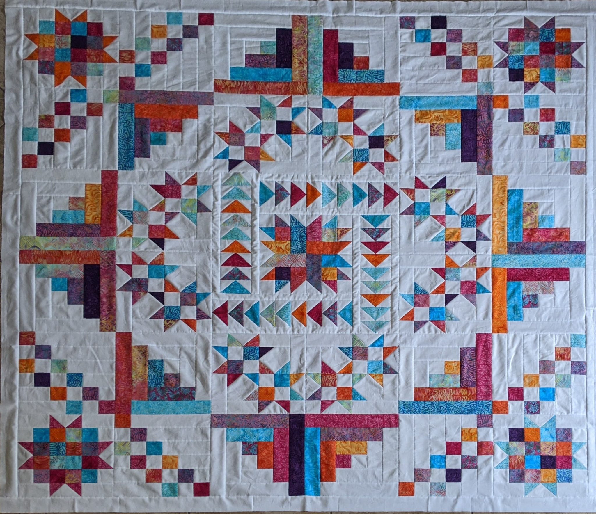 quilts-in-the-wild-warmth-of-our-stars-quilts-quilting-daily